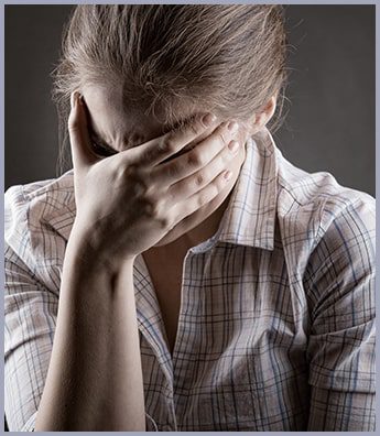 Woman Covering Her Face